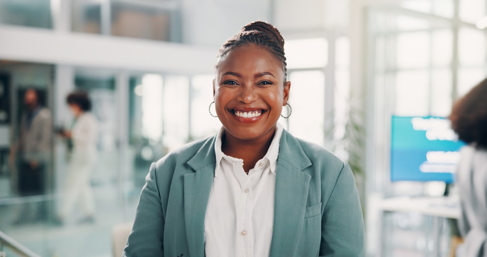 Picture of five (5) girls interacting with an iPad
