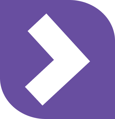 Two adults working on separate laptops